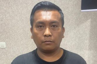 Sosok dan Profil Michael Gomgom, Pelaku Pemerasan Penumpang Grab Car Rp100 Juta